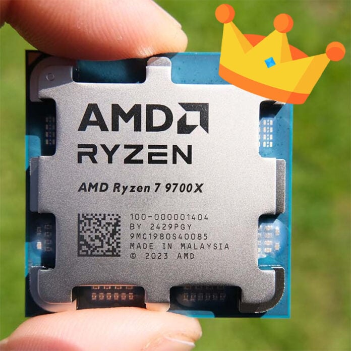 A Ryzen 7 9700X held between two fingers, wearing an emoji crown.