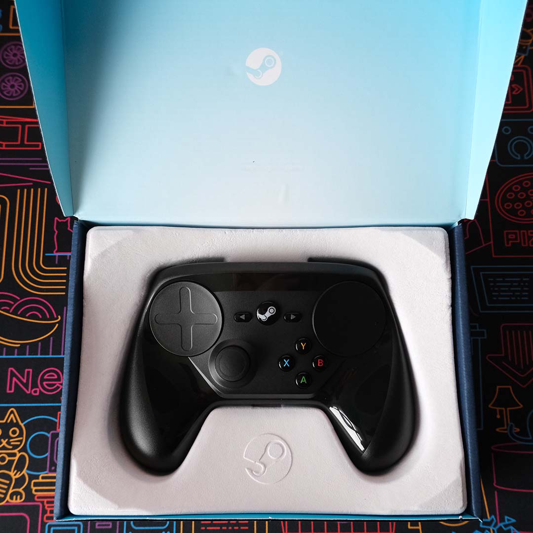 A Steam Controller in its retail packaging.,
