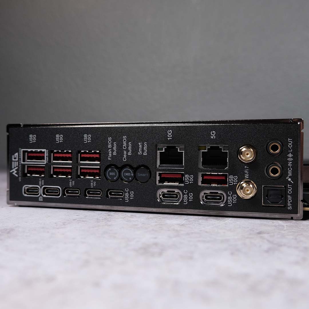 A close-up of the USB ports on the back of the MSI MEG X870E Godlike X motherboard.