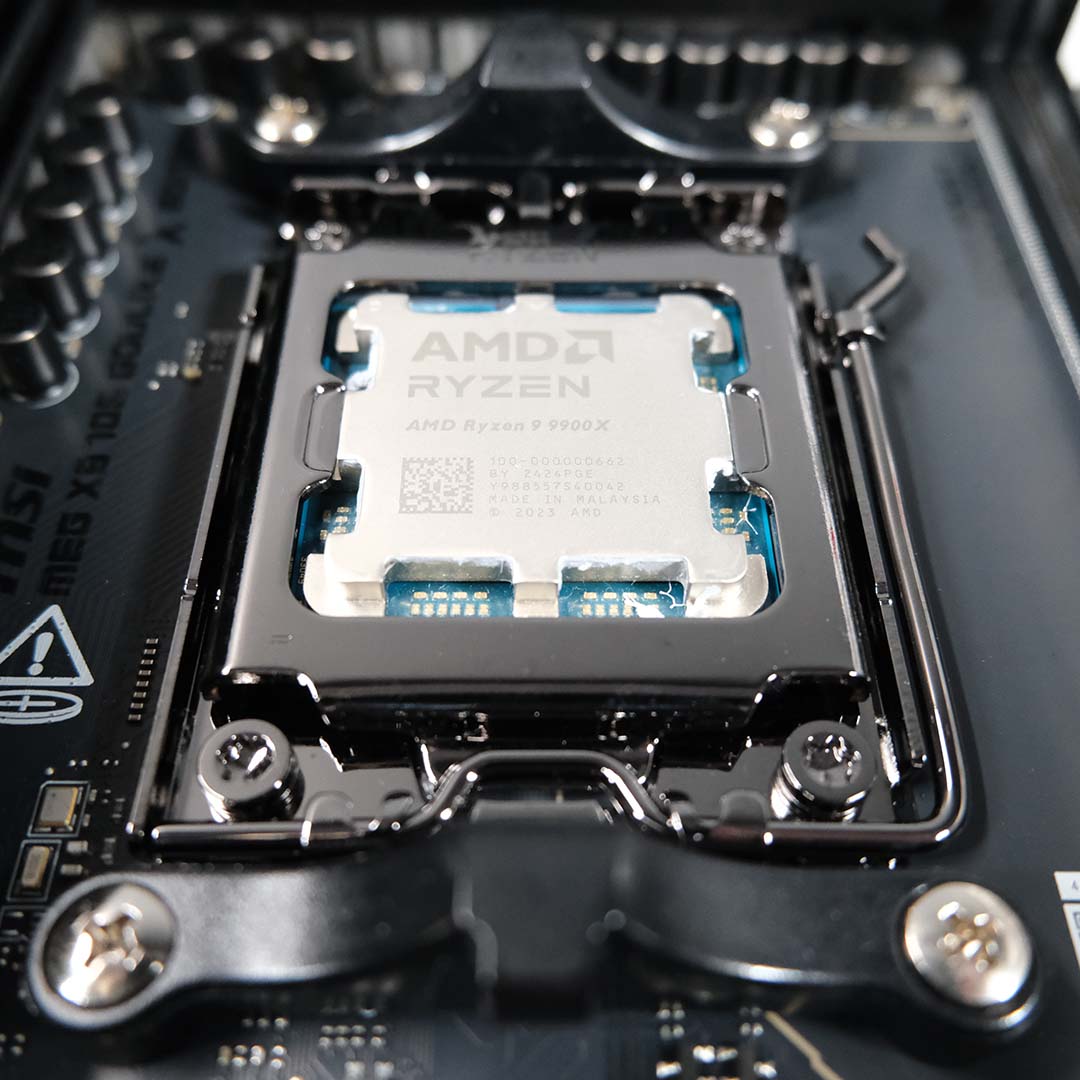 An AMD Ryzen 9 9900X installed inside the MSI MEG X870E Godlike X motherboard.
