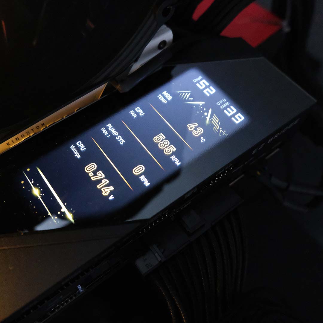 A top-down shot of the EZ Bridge, its LCD screen lit up and displaying system information.