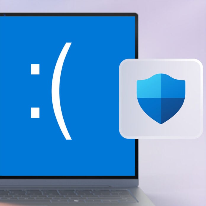 A BSOD (Blue Screen of Death) appears on a Laptop, with a Windows Defender symbol floating to its right.