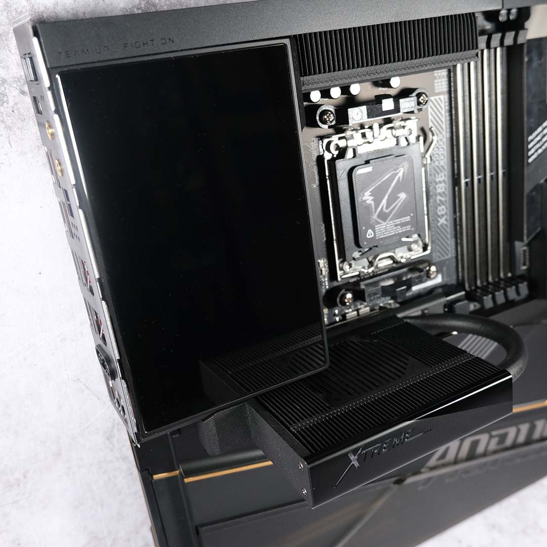 The M.2 Thermal Guard Xtreme installed in the Gigabyte X870E Aorus Xtreme X3D AI TOP, its tall heatsink extending well past the VRM.