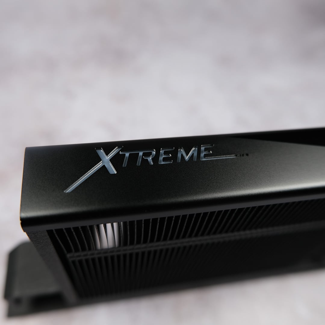 A close-up of the 'Xtreme' logo on the top of the M.2 Thermal Guard Xtreme, as bundled with the Gigabyte X870E Aorus Xtreme X3D AI TOP.