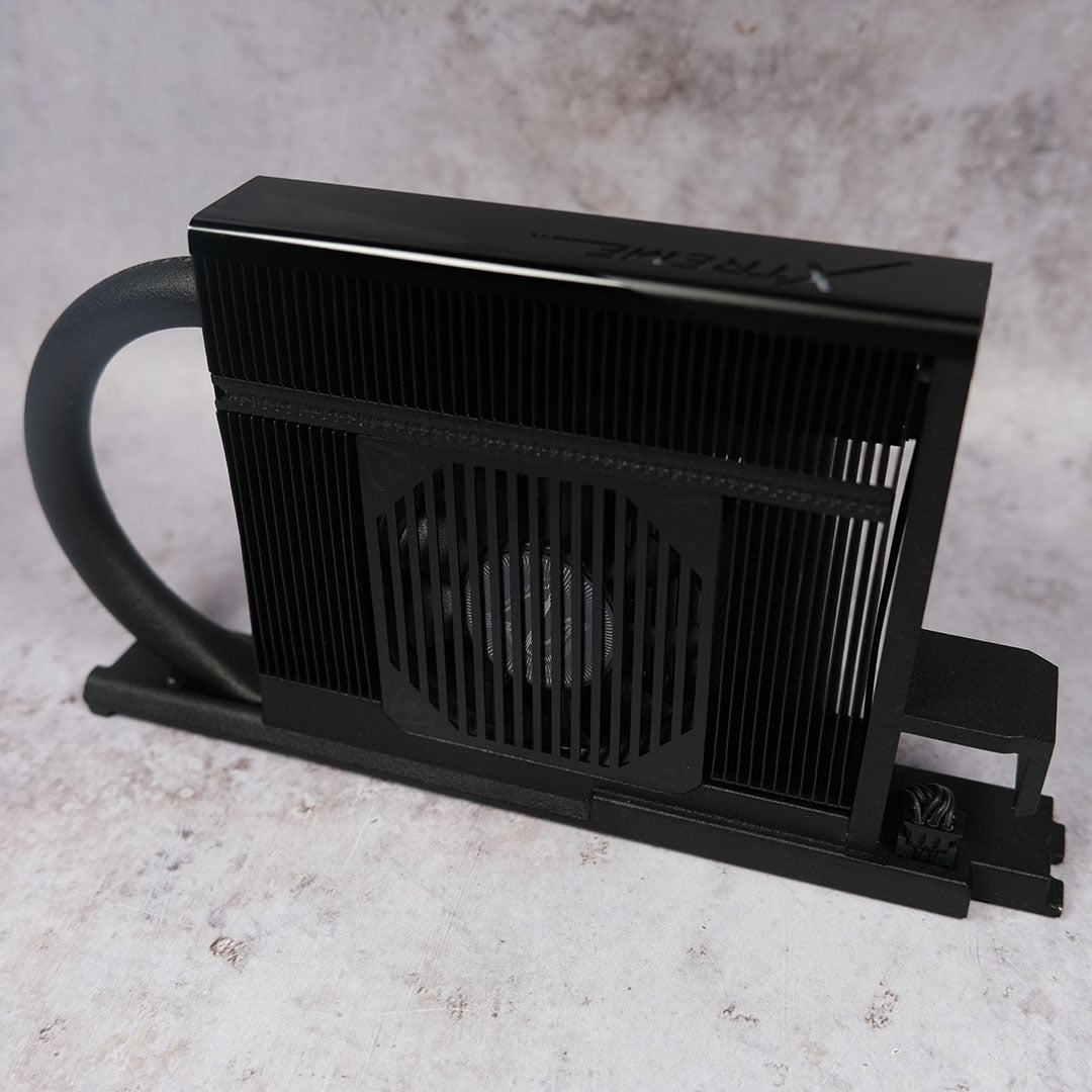 The M.2 Thermal Guard Xtreme, showcasing its active cooling via a fan.