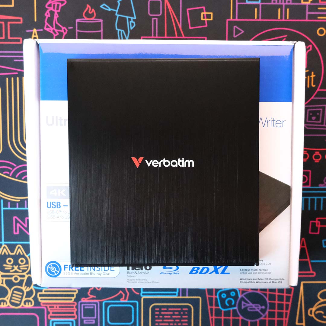 A 4K Blu-ray drive, atop its packaging.