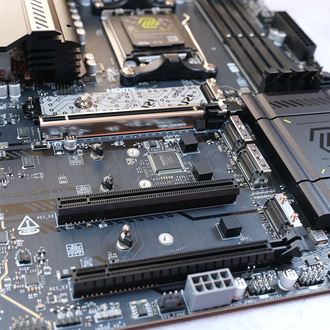 A side-on view of the motherboard's expansion slots, their covers removed.