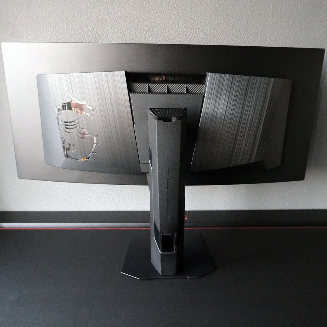 A wide shot, showcasing the rear of the MSI MPG 341CQR QD-OLED X36.