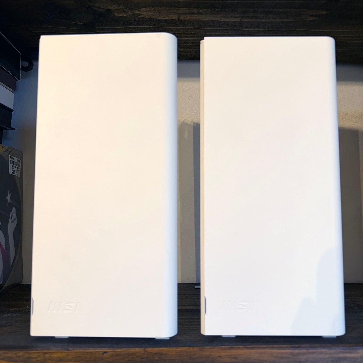 MSI Roamii Be Pro review: Two tower nodes on shelf showing fronts