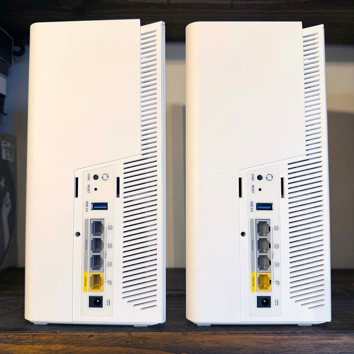 MSI Roamii Be Pro review: Two tower nodes on shelf showing rear ports