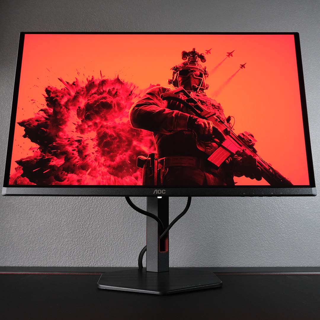 An AOC Q27G4SDR monitor displays key art from Battlefield 6.