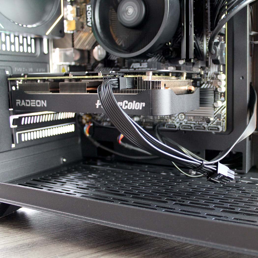 AWD-IT Kalona PC PowerColor Radeon RX 9060 graphics card and cable routing at the bottom