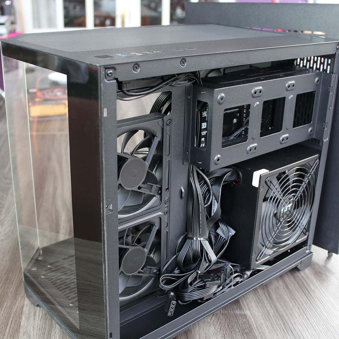 AWD-IT Kalona PC sidepanel removed showing PSU and cables from angle