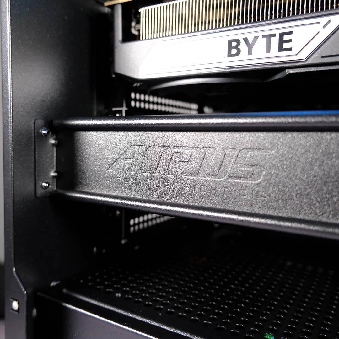 A close-up of the GPU bracket inside the Gigabyte Aorus Prime 5, focussing on its logo.
