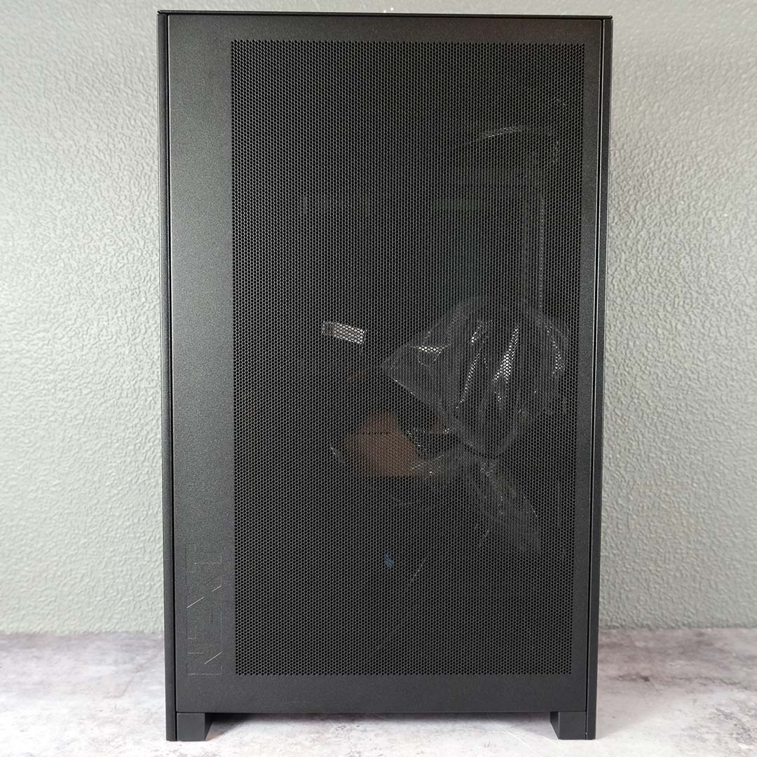 A side view of the NZXT H2 Flow, panels on, accessories inside.