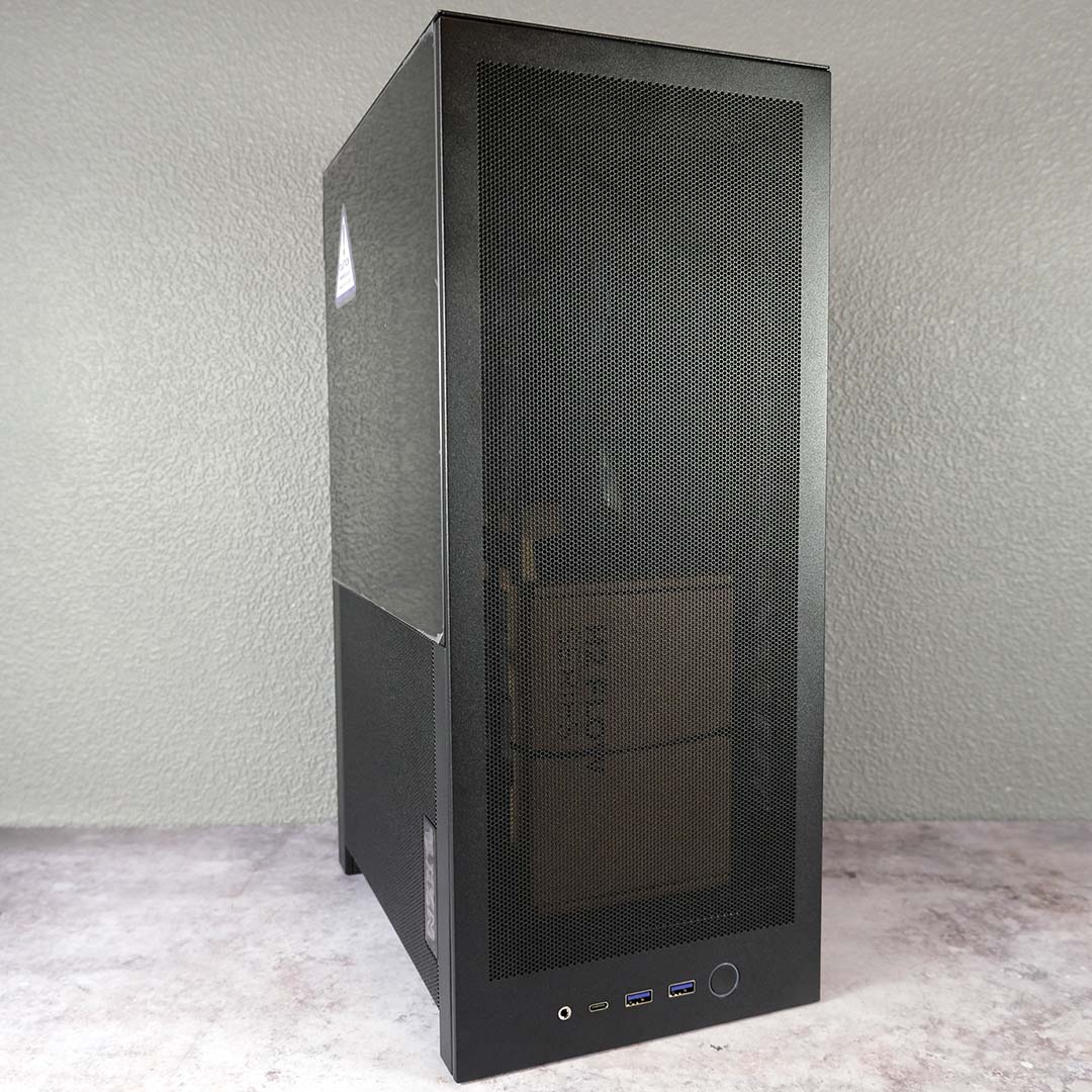 A front-side view of the NZXT H2 Flow, panels on, accessories inside.