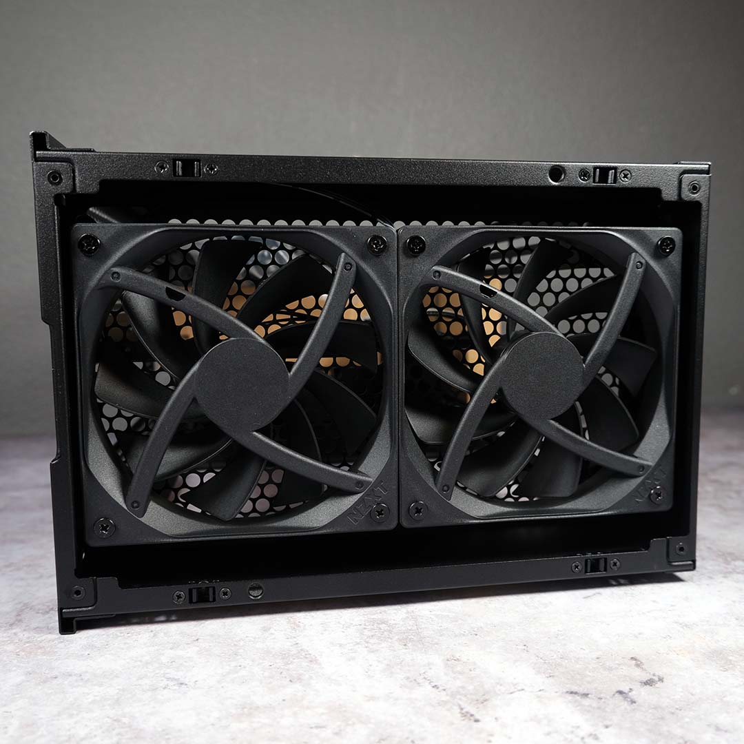 A close-up of the stock fans installed within the top enclosure of the NZXT H2 Flow.