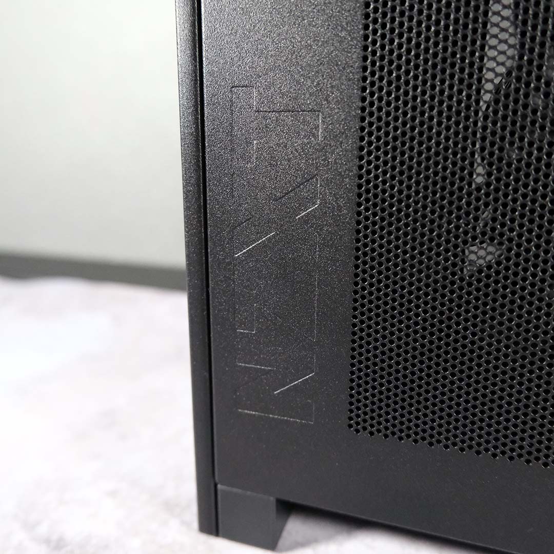 The NZXT logo, running up the side of one of the NZXT H2 Flow's side panels.