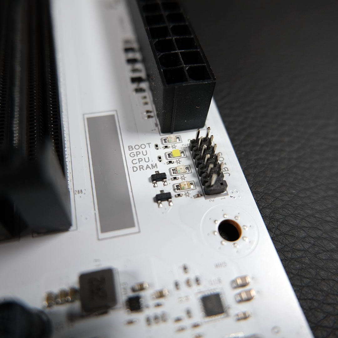 A close-up of the Sapphire Pure X870A WiFi 7 Debug LEDs.