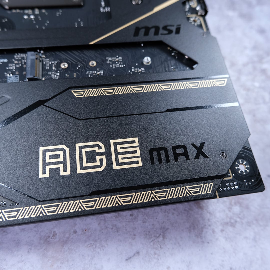 A close-up of the 'Ace Max' logo on the MSI MEG X870E Ace Max's backplate.