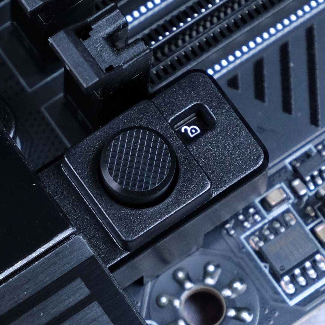 A close-up of the EZ PCIe Release toggle on the MSI MEG X870E Ace Max motherboard.