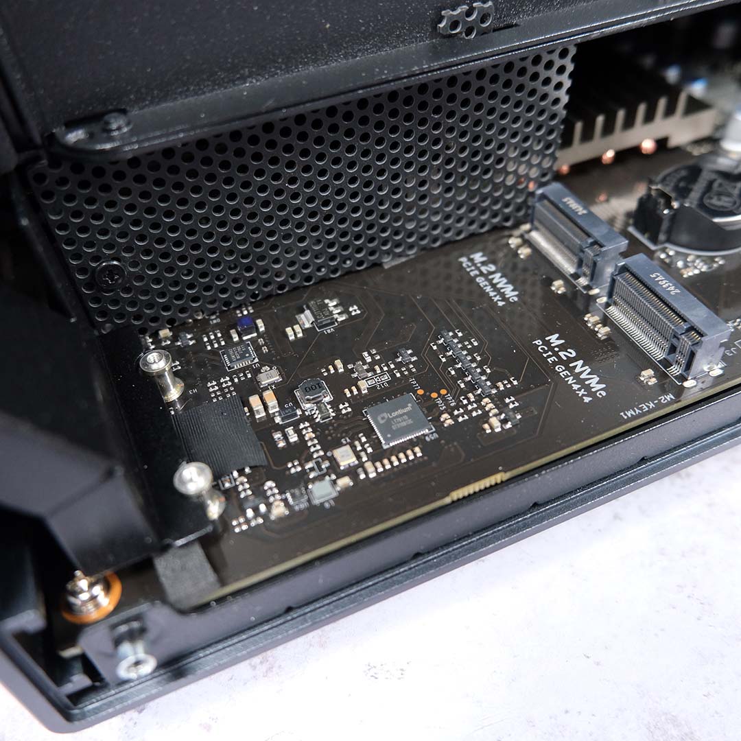 A close-up of unpopulated M.2 slots inside the Ugreen NASync iDX6011 Pro.