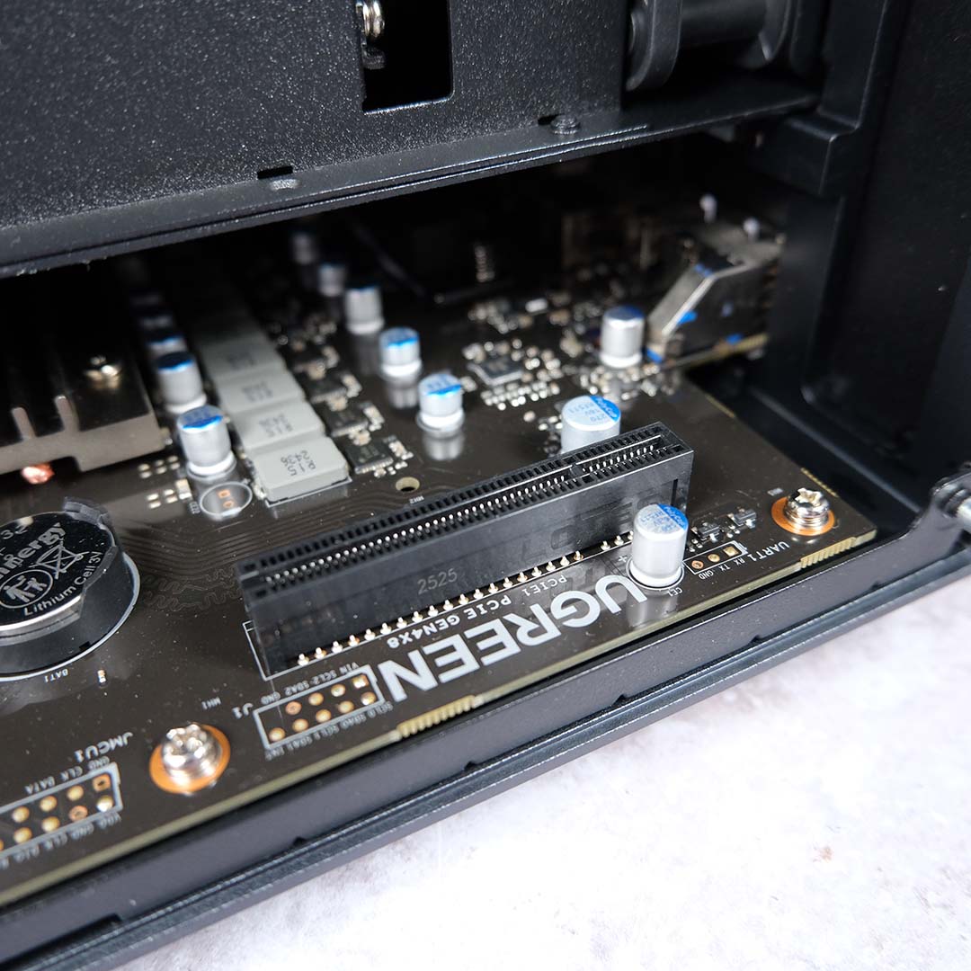 A close-up of the PCIe Gen 4 x8 expansion slot in the Ugreen NASync iDX6011 Pro.