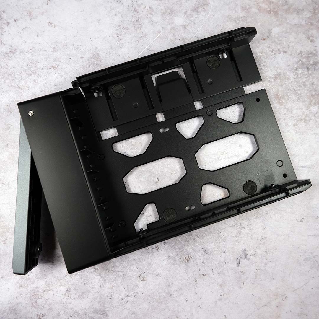 The top of one of the Ugreen NASync iDX6011 Pro drive bays.