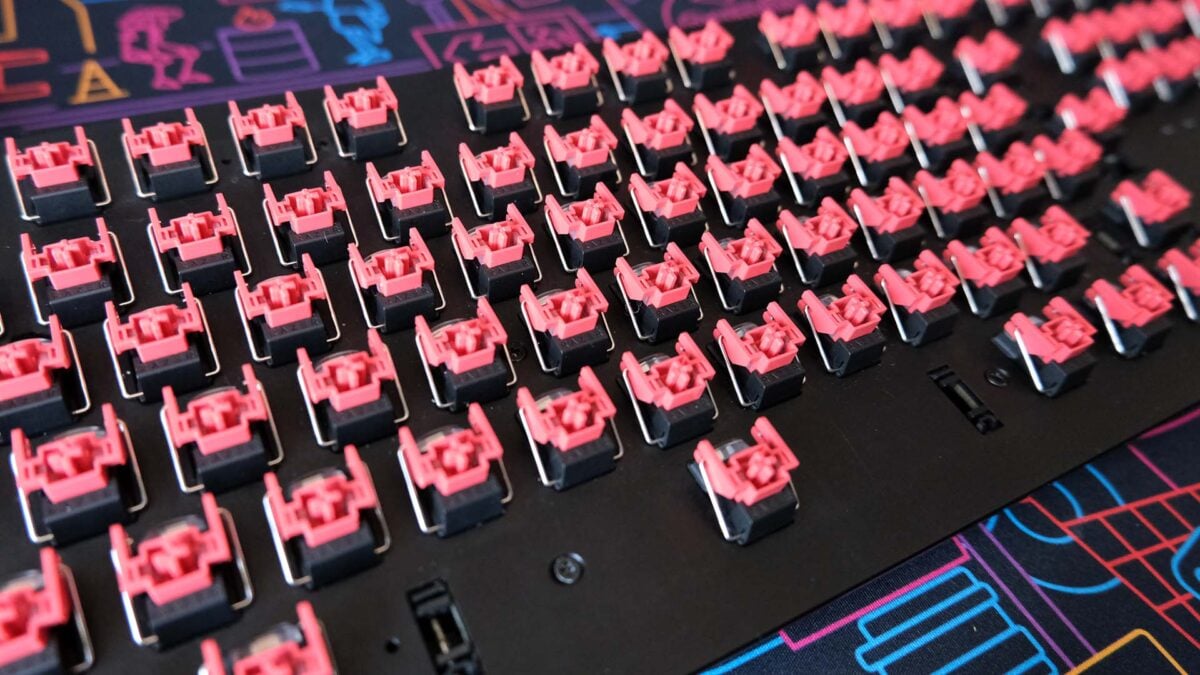 A close-up of the red switches on a Razer Huntsman V2 keyboard.