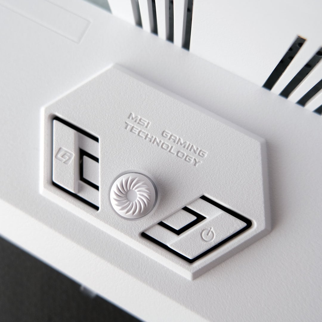 A close-up of the OSD controls on the MSI MAG 272QPW QD-OLED X28 monitor.