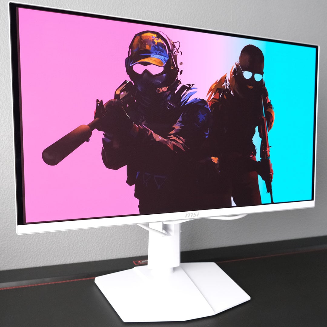 The MSI MAG 272QPW QD-OLED X28 monitor, displaying a Counter-Strike 2 wallpaper.