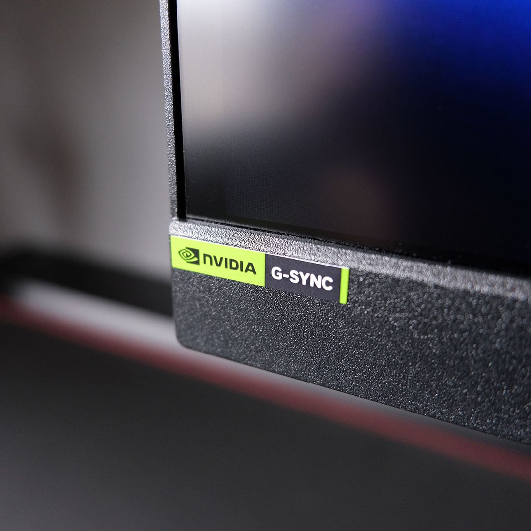 A close-up of the Nvidia G-Sync logo on the MPG 272QRF X36 monitor.