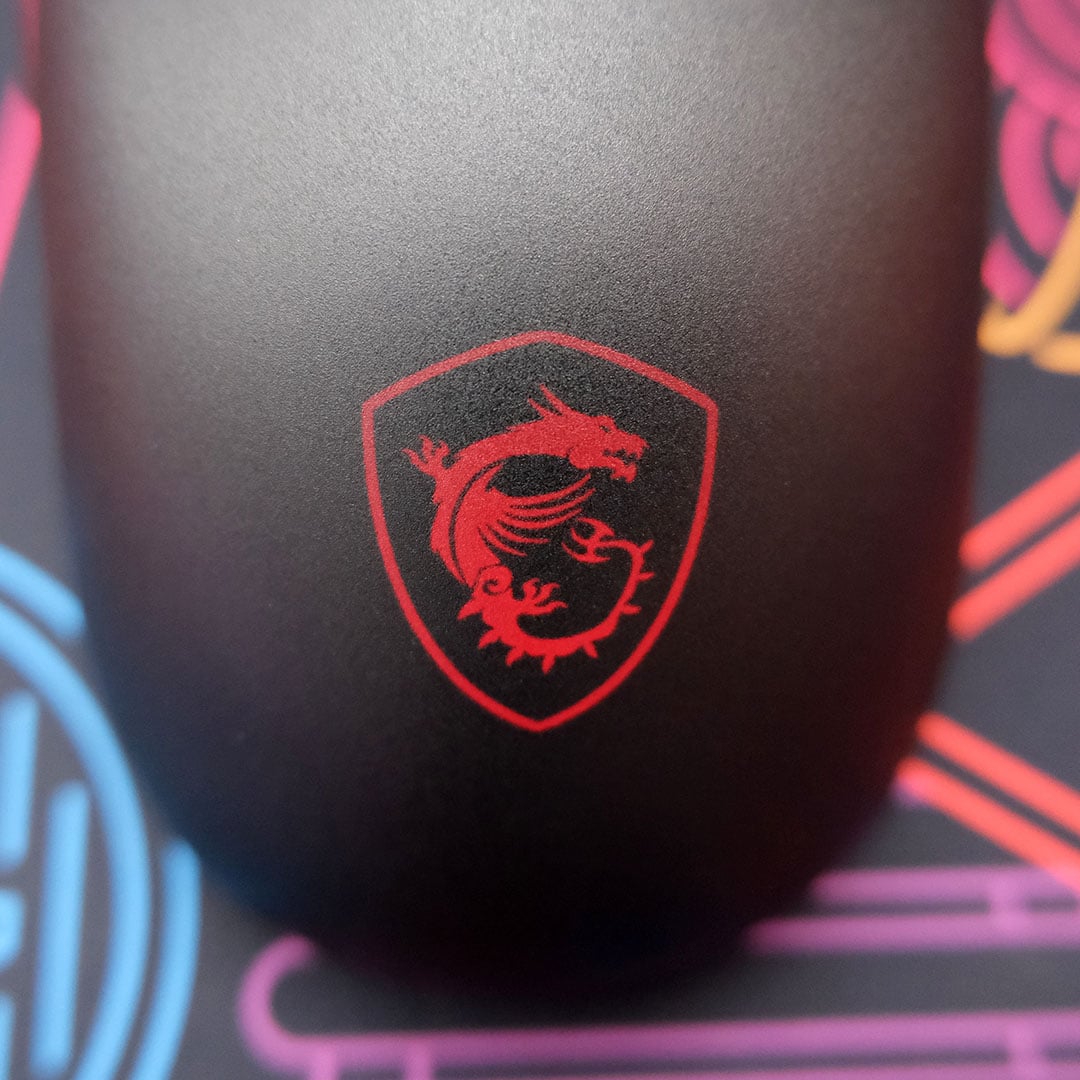 A close-up of the dragon logo on the MSI Vera 300 Wireless 8K.