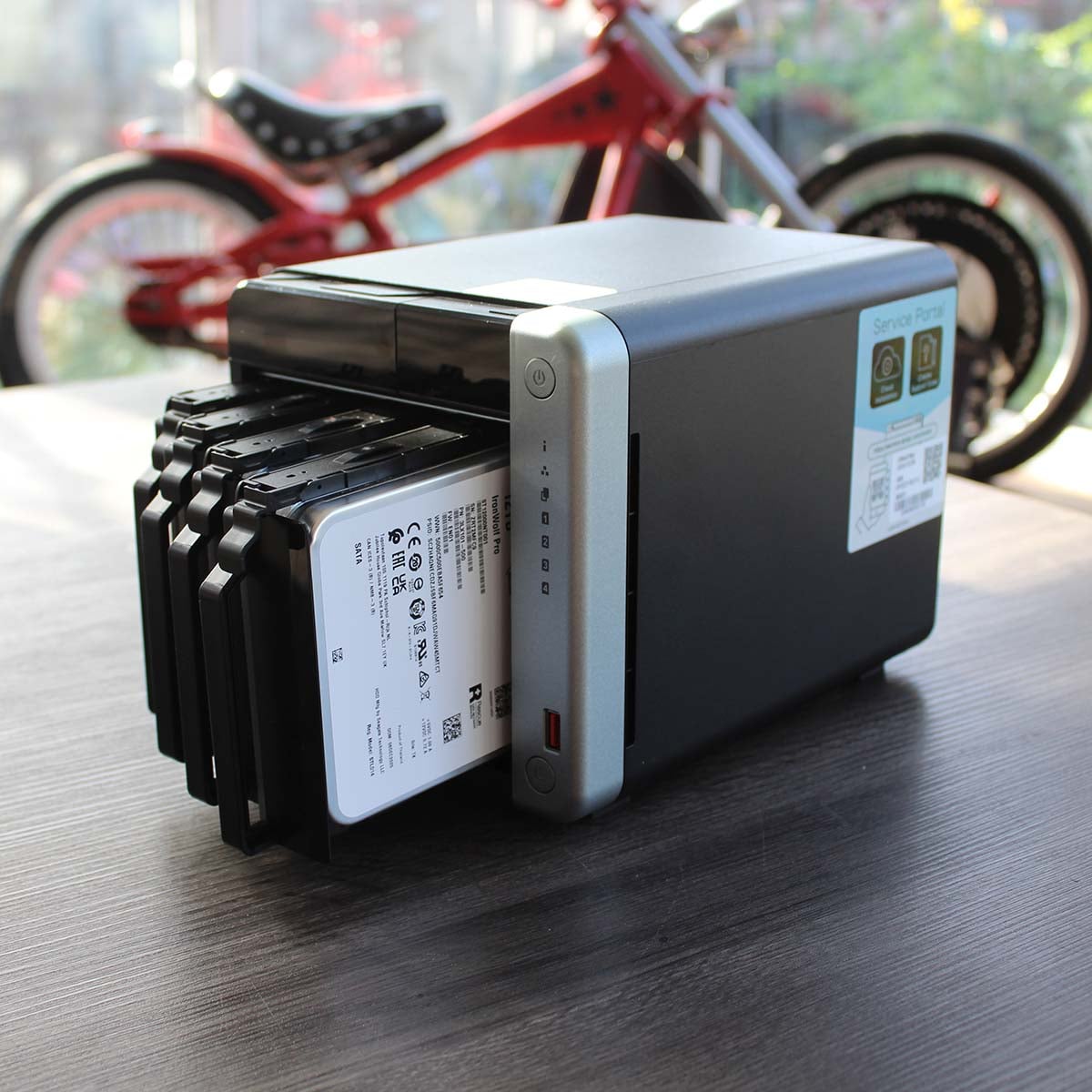 QNAP TS-x62A NAS containing four 12GB Seagate IronWolf Pro hard drives