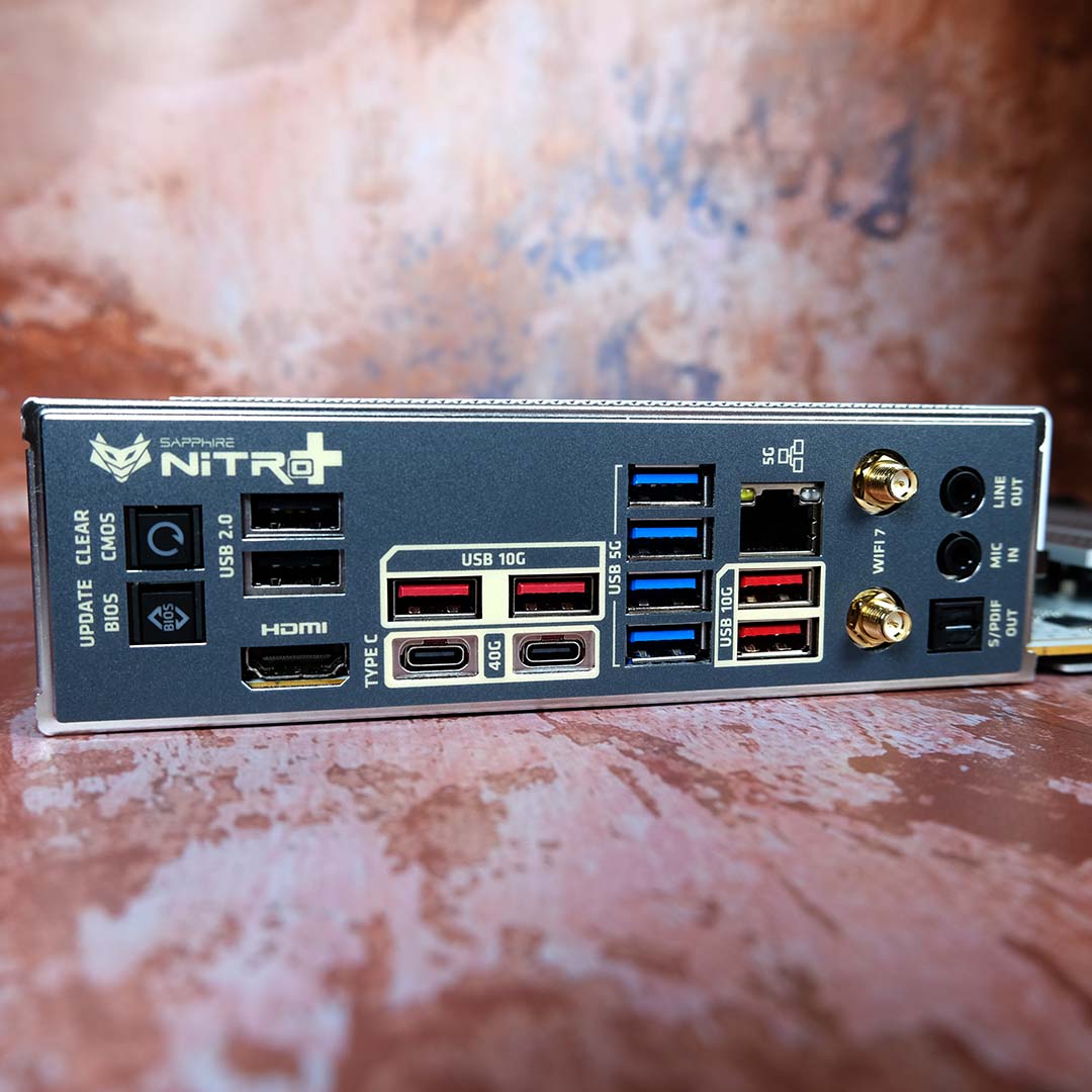 A close-up of the Sapphire Nitro+ X870EA PhantomLink Polar Edition's rear I/O.