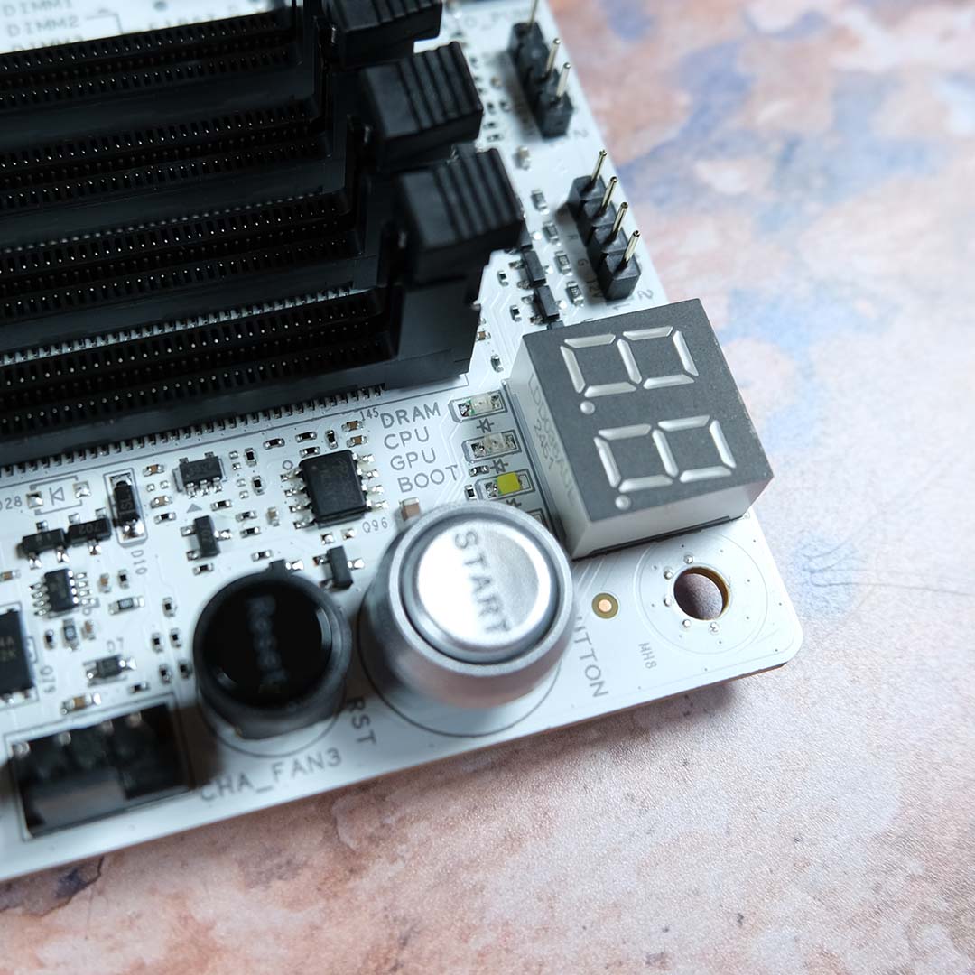 A close-up of the debug LEDs on the Sapphire Nitro+ X870EA PhantomLink Polar Edition.