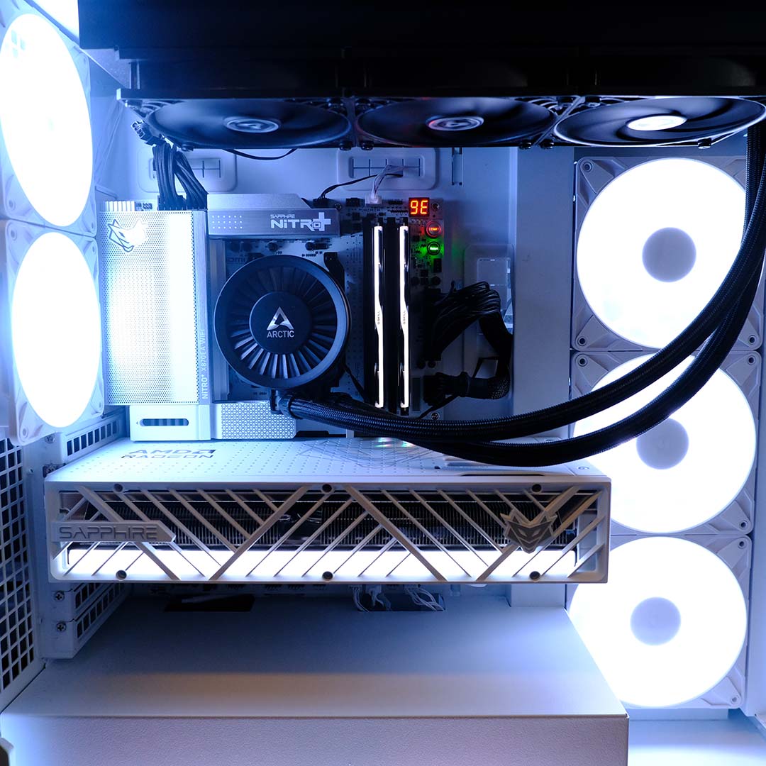 The Sapphire Nitro+ X870EA PhantomLink motherboard, populated with components inside a case.