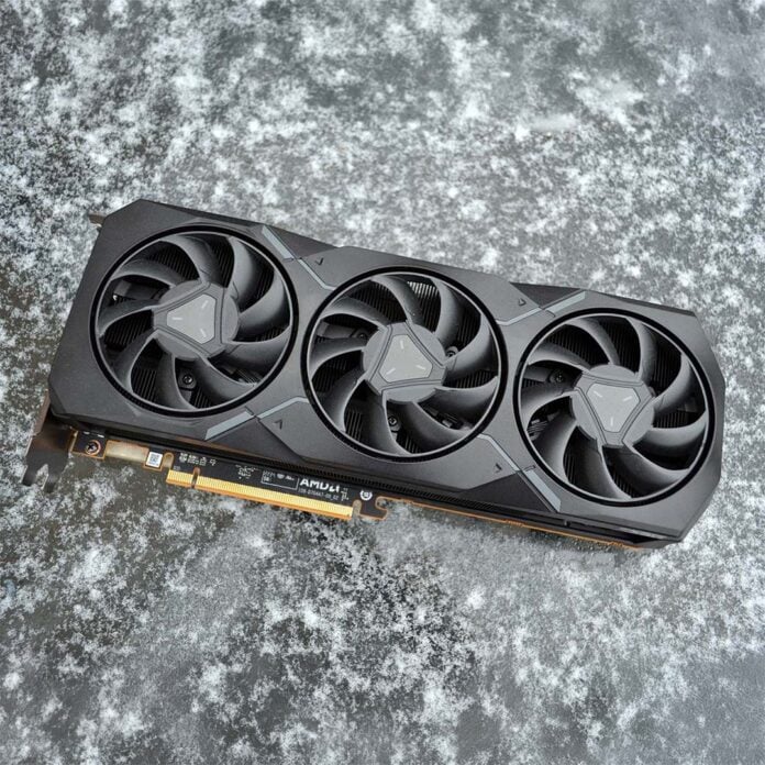 An AMD Radeon RX 7000 series graphics card, atop an icy surface.