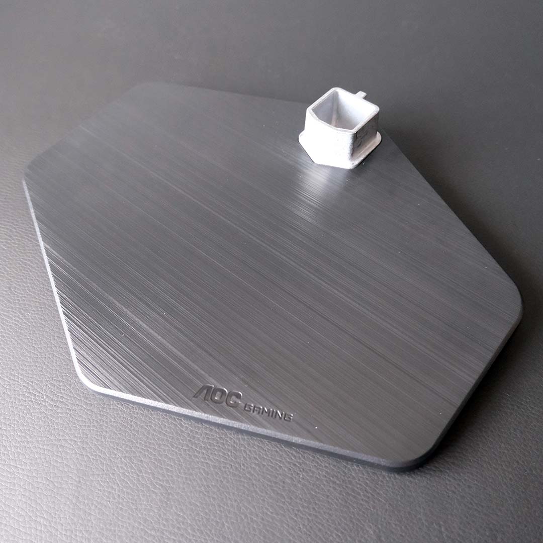 A close-up of ports of the base for the AOC Q27G4ZR.
