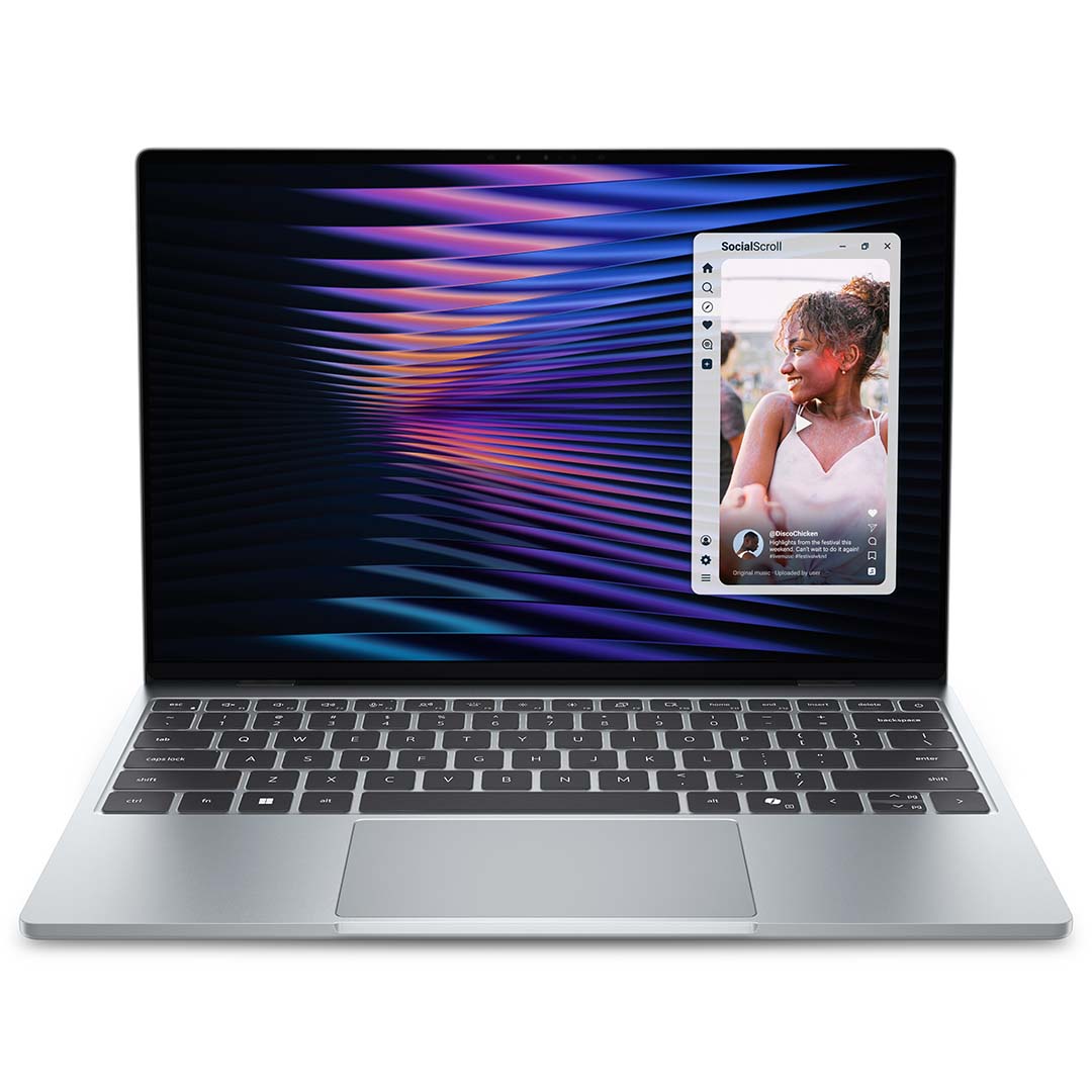 A Dell XPS 13 laptop, its display and keyboard are visible.