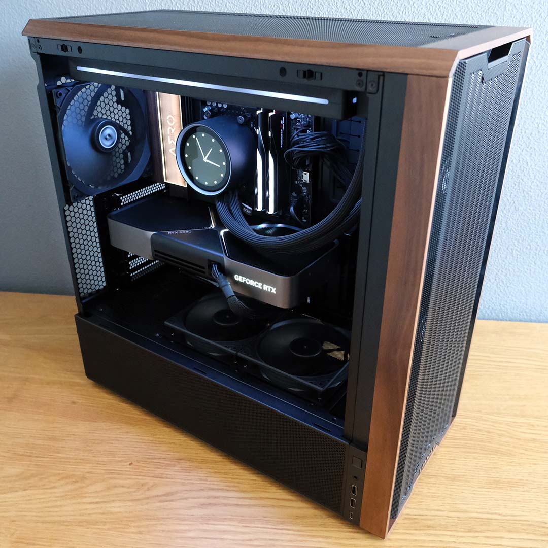 A close-up of the Gigabyte X870E Aero X3D Wood motherboard as part of a complete build.