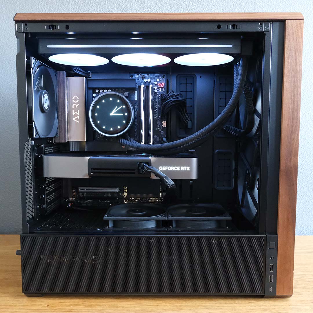 A close-up of the Gigabyte X870E Aero X3D Wood motherboard as part of a complete build.