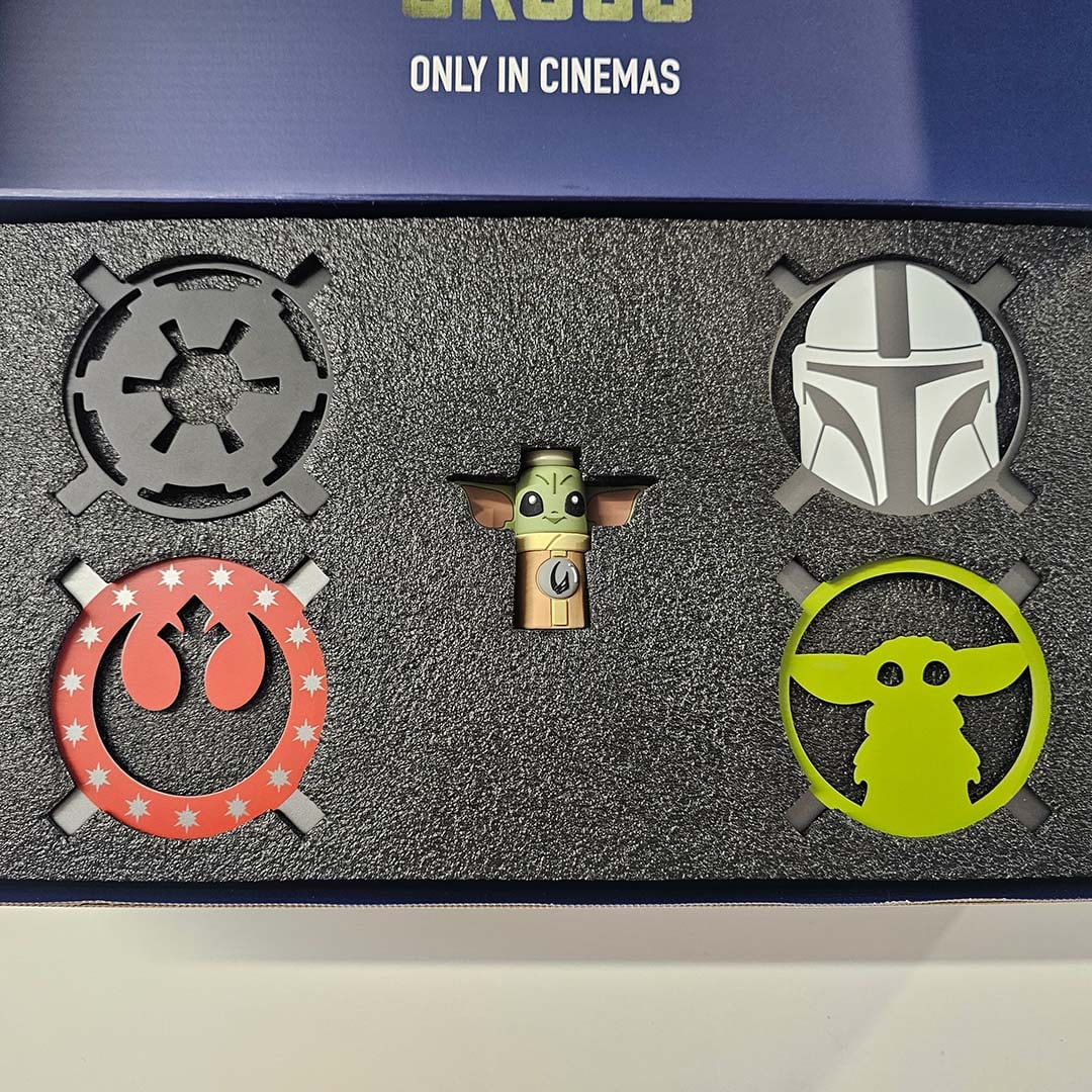 A top-down view of the VGA stand (centre) and magnetic backplates (surrounds), for the MSI GeForce RTX 5080 16GB The Mandolorian and Grogu Edition OC.