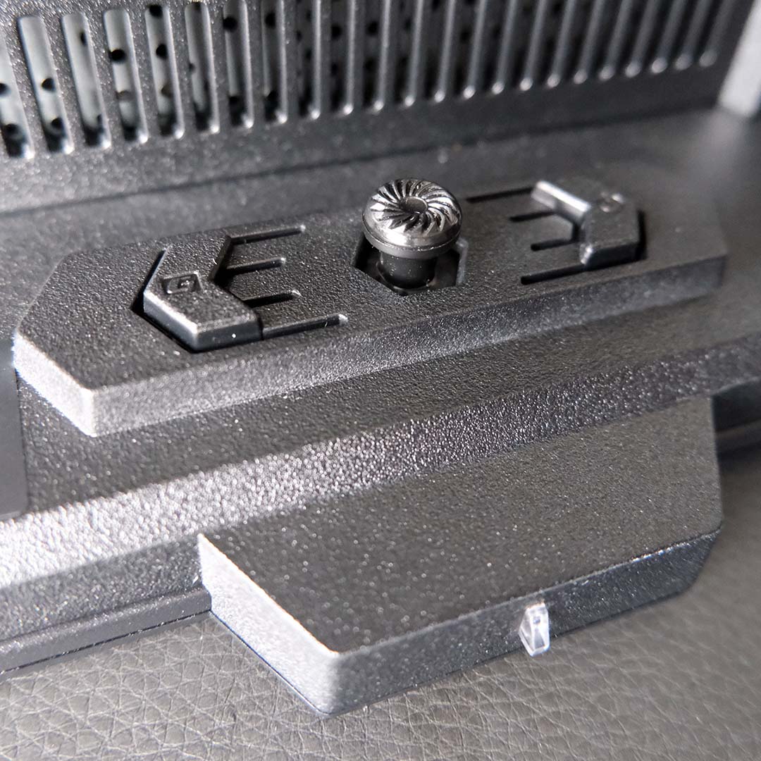 A close-up of the joystick OSD controls on the MSI MPG 322UR QD-OLED X24.