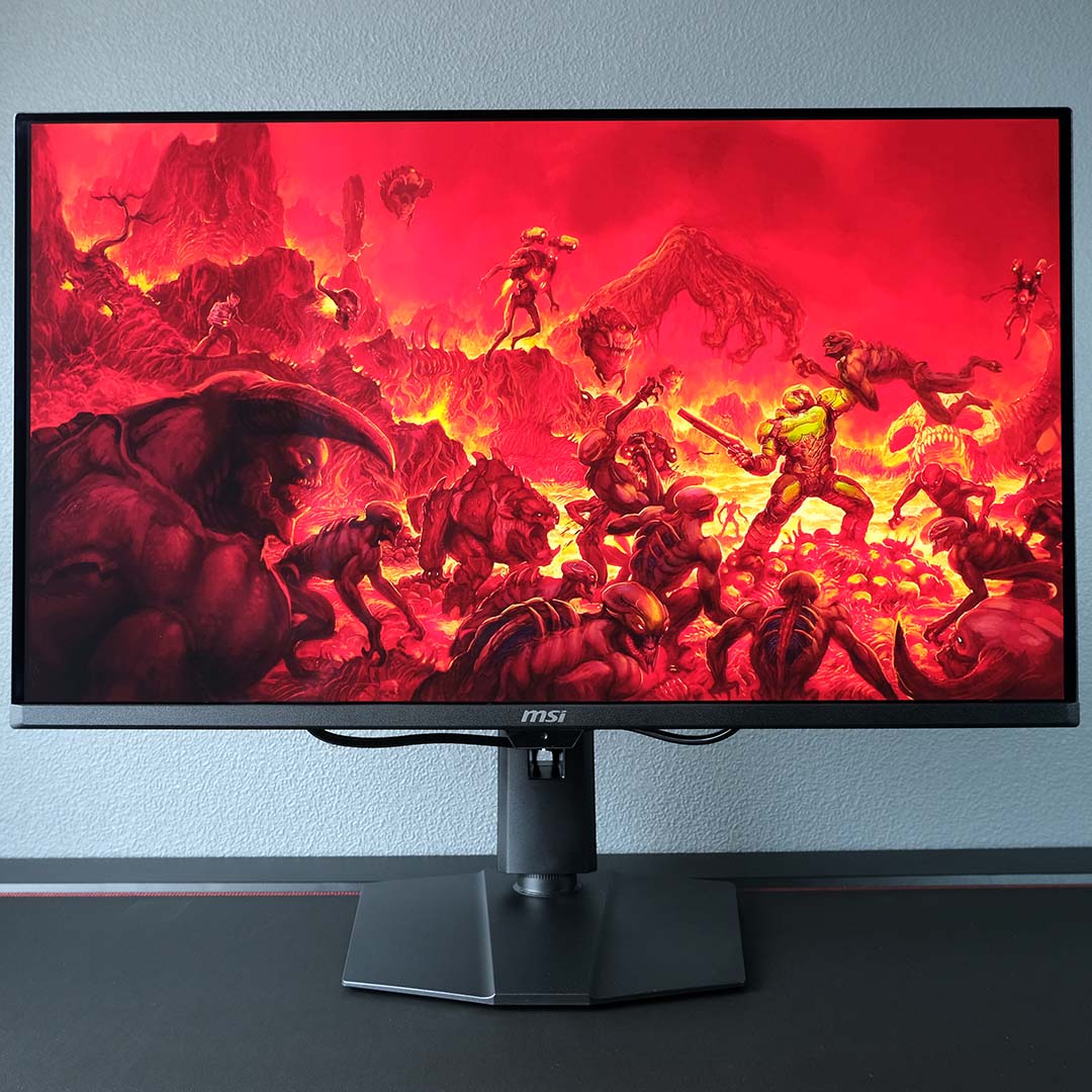 The MSI MPG 322UR QD-OLED X24 displaying artwork from Doom (2016).