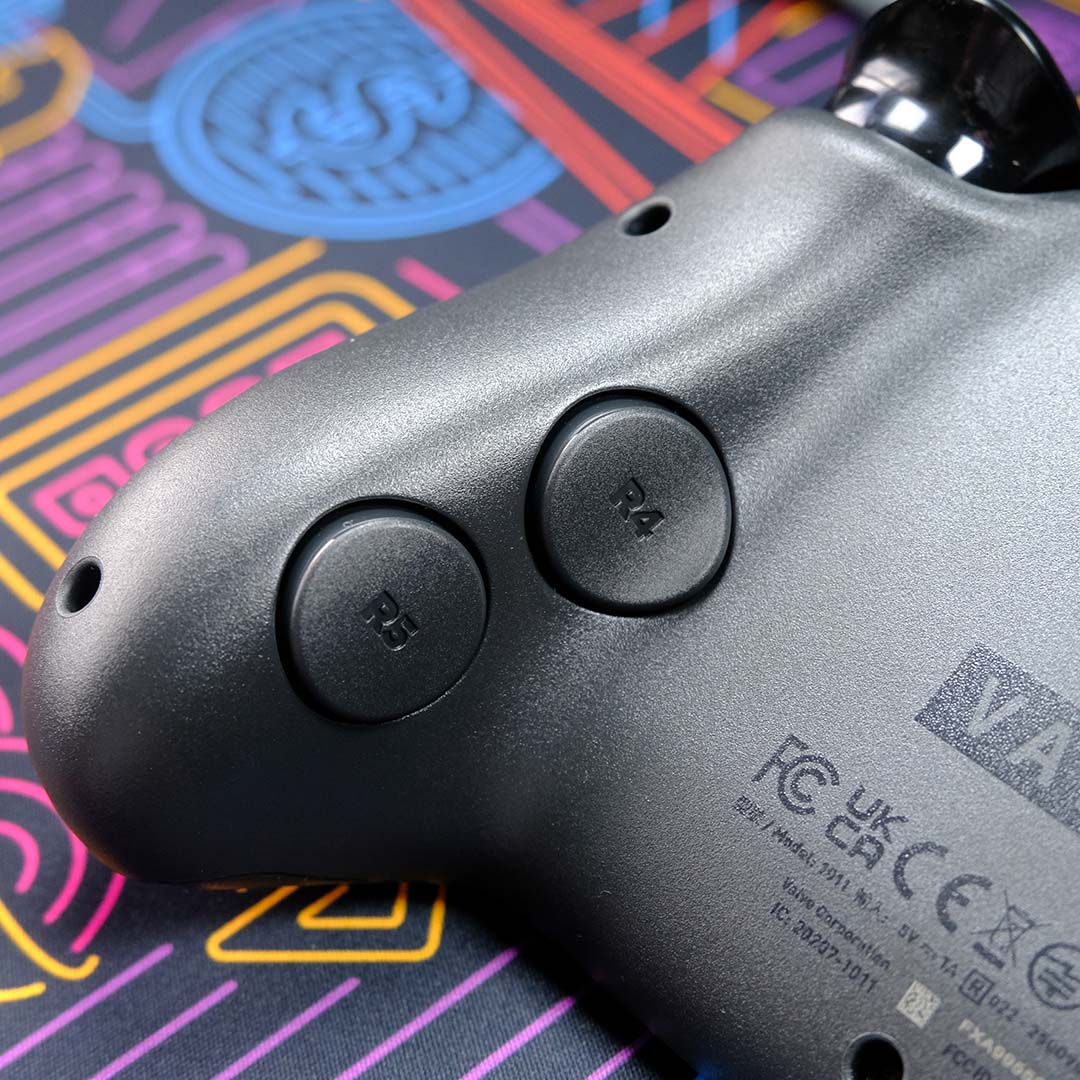 A close-up of the Steam Controller's back buttons.