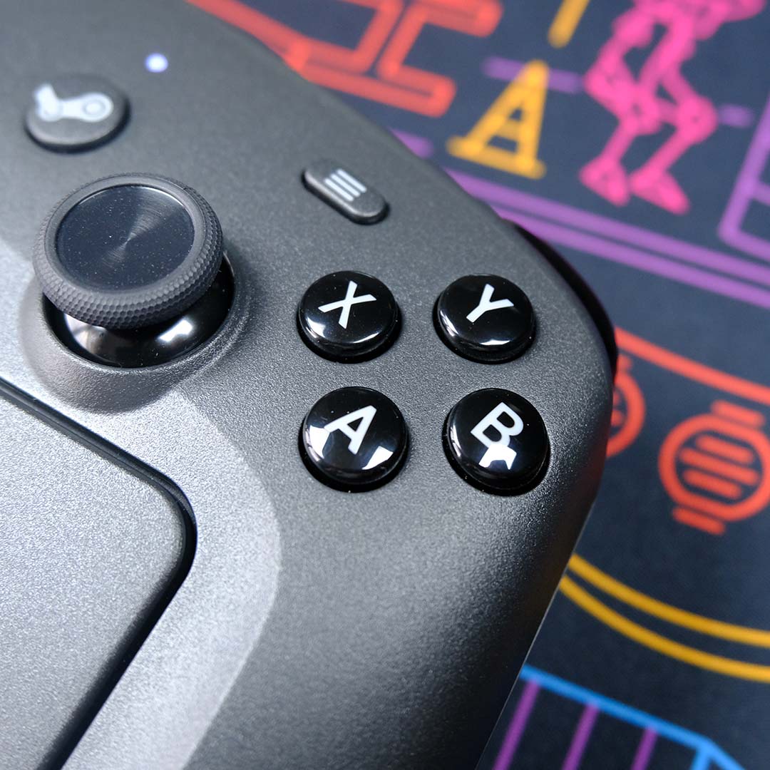 A close-up of the Steam Controller's right thumbstick and face buttons.
