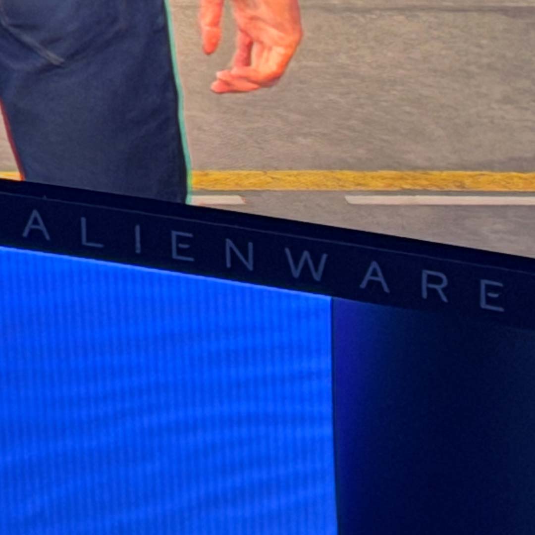 A close-up of the Alienware logo on the AW3426DW.