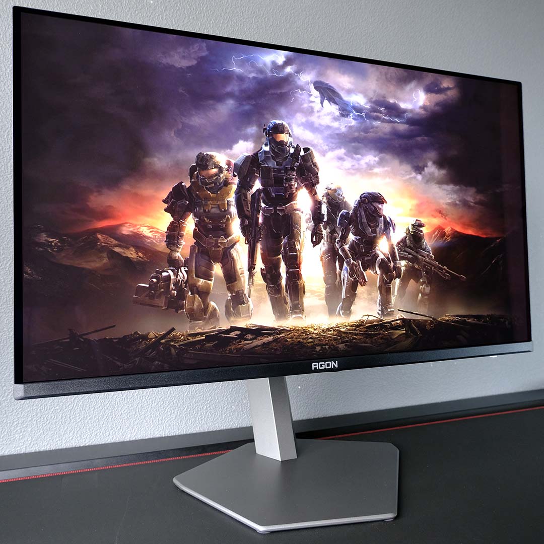 An AOC Agon Pro AG326UZD2 monitor, displaying Halo: Reach artwork.