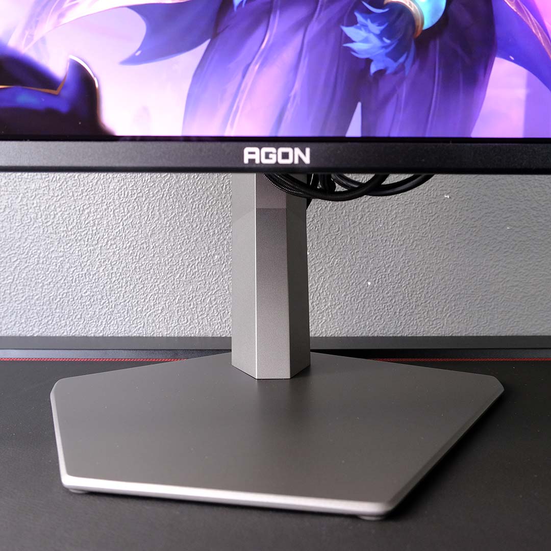 A close-up of managed cables on an AOC Agon Pro AG326UZD2 monitor.